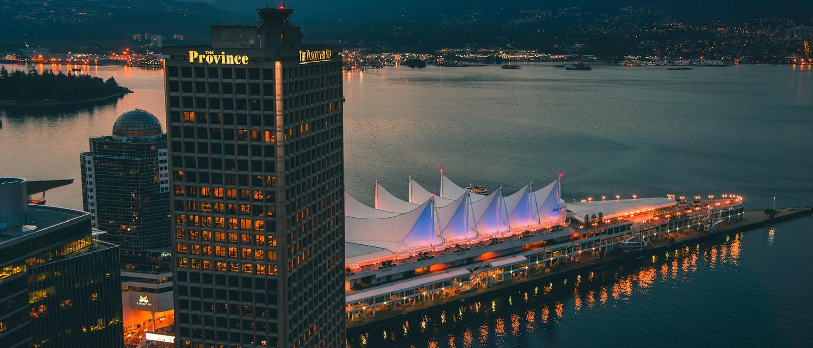 Canada Place and downtown Vancouver at dusk — where the city's business networking events happen